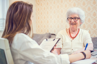 speech therapist evaluating a client with Dementia